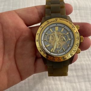 Invicta green and gold watch